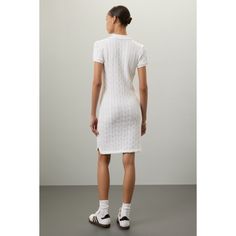 White (100% cotton). Casual dress. Collared. Short sleeves. Front button closure. 36.5" from shoulder to hemline. Imported. Classic White Cotton Dresses, White Cotton Day Dresses, White Cotton Daywear Dress, White Cotton Dress For Daywear, Classic Cotton Spring Dress, Fitted Cotton Midi Dress For Day Out, Cotton Fitted Midi Dress For Day Out, Classic White V-neck Shirt Dress, Classic Cotton Knee-length Midi Dress