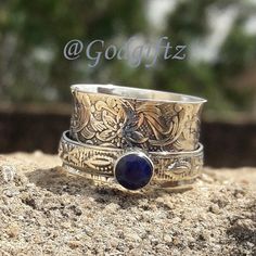 Blue Sapphire Gemstone Ring Silver Ring Silver Jewelry Handmade Ring Thumb Ring Spinner Ring Meditation Ring Fidget Ring Sapphire Jewelry Metal : 925 Sterling Silver Weight (Gms) : 9 Gms Approx Style : Spinner Ring Ring Size : all Main Stone : Blue Sapphire Stone Shape : Round Stone Size : 5 mm Stone Cut : Faceted Healing Properties : The Blue Sapphire is traditionally associated with purity and love. It assists you to stay on the spiritual path, releasing blockages and providing strength. Blue Fidget Jewelry, Gemstone Rings Unique, Jewelry Sapphire, Unique Silver Rings, Gemstone Ring Silver, Blue Sapphire Ring, Fidget Rings, Meditation Rings, Silver Spinner Rings