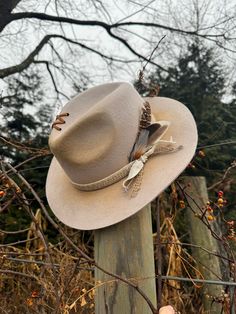 Hand burned wool fedora with feather Brown Brimmed Fedora With Feathers, Handmade Brimmed Fedora For Western-themed Events, Artisan Fedora With Curved Brim For Western-themed Events, Fedora Felt Hat With Feathers For Western-themed Events, Western-themed Fedora Hat With Feathers, Cowboy Hat Design, Custom Cowboy Hats, Hand Burn, Wool Fedora