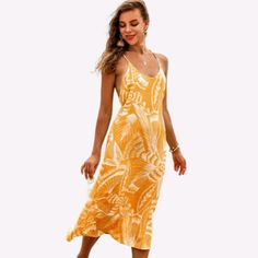 Women's Yellow Floral Crisscross Midi Slip Dress - Cupshe Size L New With Tags 8 Size: L Fit & Style Ankle Length Slip Dresses Scoop Neck Crisscross Back Loose Waisted Casual Fit The Pattern Is One Of A Kind - The Exact Pattern You Receive Will Be Slightly Different Than The One Shown Hand Wash. Recommend With Cold Water. Do Not Use Bleach. Do Not Tumble Dry. Description Our Yellow Floral Crisscross Maxi Dresses Is Our Favorite Beach Dress To Get Us In The Mood For Summer. This Maxi Dress Is Dra Yellow V-neck Beach Dress For Spring, Yellow Maxi Dress For Brunch During Beach Season, Yellow Sundress For Summer Day Out, Orange Midi Dress For Beach Season, Orange Beach Midi Dress, Yellow Summer Beach Dress For Day Out, Chic Yellow Sundress For Beach, Yellow Beach Dress For Summer Day Out, Yellow Spaghetti Strap Maxi Dress For Beach Season