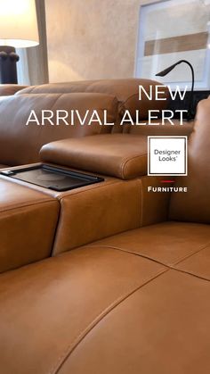 a brown leather couch with the text new arrival alert