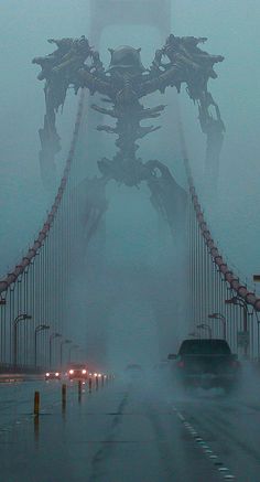 cars driving across a bridge in the fog on a road with an alien like structure