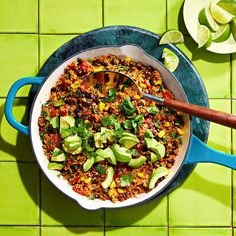 a large pot filled with food on top of a green table