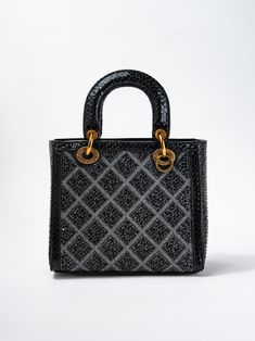 The Callista Grid Pattern Rhinestone Snakeskin Convertible Bag is a must-have for any fashion forward individual. With its unique grid pattern and luxurious snakeskin material, this bag will elevate any outfit. Complete with stunning rhinestone accents, it can be worn as a shoulder bag or converted into a stylish crossbody. Perfect for day or night, this bag is versatile and statement-making. SizeHEIGHT: 9.5"WIDTH: 7.5"DEPTH: 4" QualityMade with premium materials for quality and endurance Import Top Handle Shoulder Bag With Rhinestones For Everyday, Luxury Black Rhinestone Shoulder Bag, Designer Bags With Rhinestones For Everyday Use, Glamorous Top Handle Shoulder Bag For Everyday Use, Luxury Rhinestone Shoulder Bag For Everyday Use, Glamorous Shoulder Bag With Detachable Strap For Everyday, Luxury Rhinestone Bags For Shopping, Convertible Bags, Grid Pattern