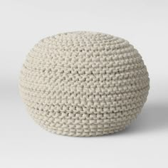 a white ball sitting on top of a table