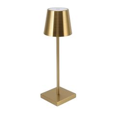 a gold lamp on a white background