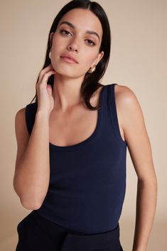 The Scoop It Up Tank in Navy Chic Ribbed Scoop Neck Tank Top, Fitted Ribbed Tank Top With Scoop Back, Chic Scoop Neck Tank Top For Layering, Elegant Everyday Cotton Tank Top, Chic Scoop Neck Tank Top For Loungewear, Elegant Fitted Tank Top With Scoop Back, Chic Ribbed Everyday Tank Top, Classic Everyday Seamless Tank Top, Classic Seamless Everyday Tank Top