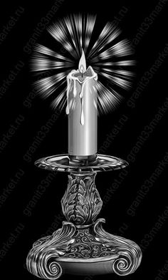 a candle is lit in the middle of a black and white photo with swirls around it