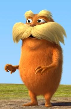 the lorax character is standing in front of a blue sky and green field