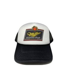 Miller Genuine Draft Beer Trucker Hat Mesh Hat Adjustable Cap Miller Hat Brand New Adults One Size Fits Most, Miller Beer Trucker Hat With Adjustable Closure In The Rear. Foam Hat With Poly Mesh Back. Color - Black / White Cap Features: 100% Polyester Front 100% Nylon Mesh Back 5-Panel Cap Seamless Foam Front Panel With Lining 8 Rows Stitching On Visor Matching Fabric Under Visor Adjustable Plastic Snap Casual White Brimmed Snapback Hat, White Trucker Snapback Hat With Short Brim, White Retro Trucker Hat With Curved Brim, Retro White Trucker Hat With Curved Brim, Vintage White Trucker Hat For Outdoor, White Curved Brim Trucker Hat, Vintage White Trucker Hat For Beach, Casual White Trucker Hat With Short Brim, White Snapback Hat With Short Brim