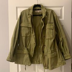 Never Worn, Free People Jacket. Fits Oversized, Size Medium But Definitely Fits Like A Large. Has A Draw String To Tighten Around Waist Area, Multiple Pockets Olive Military Utility Jacket With Cargo Pockets, Oversized Utility Jacket With Multiple Pockets And Button-up, Oversized Military Utility Jacket, Olive Military Utility Jacket With Pockets, Military-style Camouflage Utility Jacket With Multiple Pockets, Free People Jacket, Army Jacket, Free People, Jackets & Coats