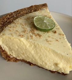 a slice of lime pie on a white plate