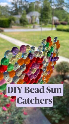 a close up of a wind chime with the words diy bead sun catchers