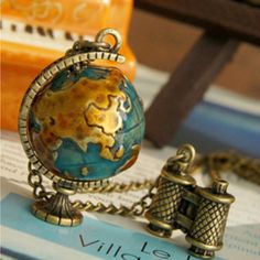 See The World Without Leaving Your Living Room With This Miniature Telescope And Globe Necklace In Antiquate Design! Amazing Style And Noble. Made Of Alloy Chain Size Is Approx. 28 In Adjustable. Pendant Size: 1.42"(L)*1.06"(W) Globe Necklace, Globe Vintage, Travel Necklace, A Globe, World Globe, Long Chain Necklace, Globe Pendant, Long Pendant Necklace, Long Pendant