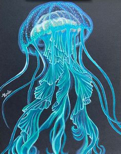 a drawing of a blue jellyfish on black paper