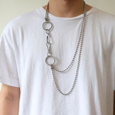 Hard Links Necklace Chain A stylish and edgy necklace with O-ring clasp links and double ball chain layers. Subtle style. Chain #1 Length: 22.4"/57cm. Chain #2 Length: 27.6"/70cm. Material: Stainless Steel/Alloy. Edgy Double Chain Link Necklace, Metal Ball Chain Link Necklaces, Trendy Metal Necklace With Ball Chain, Punk Style Metal Double Chain Necklace, Edgy Necklace, Ball Chain Necklace, Glasses Chain, Import Export, Link Necklace