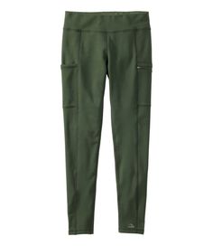 a woman's green pants with zippers on the side and pockets at the bottom