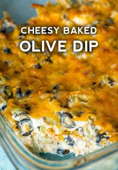 cheesy baked olive dip in a glass casserole dish with text overlay