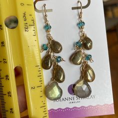 Labradorite comes in so many forms. These earrings are a combination of golden labradorite and gold/blue flash labradorite combined with apatite quartz rondelles. The wiring and chain is 14k gold filled . Please choose your earwire option. The approximate total length is 2 3/8”. Your jewelry will arrive beautifully giftboxed. Colorful Jewelry, Labradorite, Gold Filled, Flash, Drop Earrings, Chain, Gold, Blue