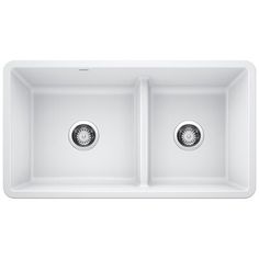 white double bowl kitchen sink with two faucets