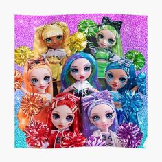 a group of dolls that are all dressed up in different outfits and hair colors with pom poms around their necks