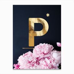 pink flowers and gold foil on a black background with the letter p in the middle