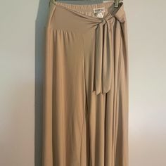 Mkm Designs Tan Capris. Never Worn . Very Cute. L Fitted Loungewear Bottoms With Tie Waist, Fitted Tie Waist Bottoms For Loungewear, Solid Tie Waist Bottoms For Spring, Solid Color Tie Waist Bottoms For Spring, Spring Solid Color Bottoms With Tie Waist, Beige High Waist Bottoms With Tie Waist, Solid Bottoms With Tie Waist For Day Out, Summer Beige Wide Leg Pants With Tie Waist, Beige Wide Leg Pants With Tie Waist For Summer