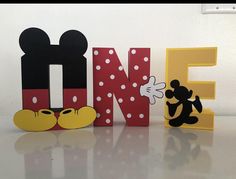 the letters are made to look like mickey and minnie mouse