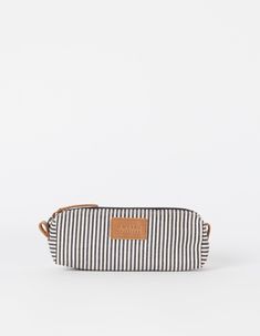 When you sit at your desk, kitchen table or maybe a local cafe, you probably don’t want to ruffle through your bag to find your long lost pens. We at O My Bag hear you! Our Signature Pencil Case is a sleek zip pouch for pens, pencils, markers and small personal items. Our striped cotton and camel leather details make this case a casual and fun take on a classic pencil case. Made from certified cotton, the Signature Pencil Case opens with a zip and lets you organize your space exactly the way you Casual Pencil Case For Everyday Use, Casual Pencil Case For Daily Use, Casual Pencil-shaped Pencil Case For Daily Use, Casual Pencil Case With Pen Holders, Casual Rectangular Travel Pencil Case, Casual Travel Pencil Case With Pen Slots, Casual Pencil Case With Pen Slots For Everyday, Casual Pencil Case With Pen Slots, Casual Rectangular Pencil Case For Everyday Use