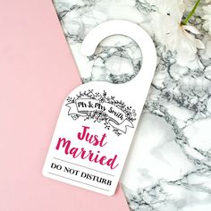 a door hanger that says, mrs and mrs miller just married do not disturb