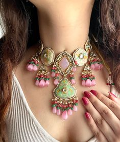 Adorn yourself in timeless elegance with this exquisite soft pink and mint green fusion necklace set, perfect for weddings and special occasions. Crafted with meticulous attention to detail, the set features delicate pink and green hues reminiscent of Pakistani and Punjabi traditions, with a touch of Bollywood glamour. Complete with matching earrings this Indian Kundan ensemble effortlessly captures the essence of sophistication and grace. Measurements: Necklace weight: 140 gms  Necklace Length- Indian Kundan Jewellery, Meenakari Necklace, Bollywood Glamour, Ceramic Jewellery, Necklace Set Indian, Back Necklace, Bollywood Jewelry, Beaded Jewelry Designs, Pink Jewelry