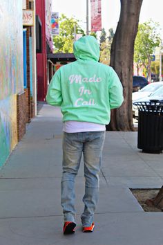 Men’s hoodie, model wearing a large Green Cotton Hoodie Outerwear, Green Hooded Sweatshirt For Streetwear, Green Spring Sweatshirt For Streetwear, Green Urban Sweatshirt For Spring, Green Sweatshirt For Spring Streetwear, Green Cotton Urban Sweatshirt, Green Hooded Hoodie, Urban Green Sweatshirt For Spring, Urban Green Winter Hoodie