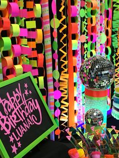 a birthday party with disco balls and streamers