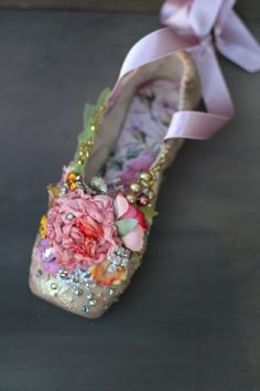 Ornate home decor piece, fairytale baroque ballerina shoe. Inspiration came one of my digital collages where i combined florals over museum canvas shoe photo and got the vision to embellish physical shoe with same rich color and details, musing the baroque era fashion. The shoe has been covered with vintage and antique ornate lace pieces (mainly tambour lace) then painted with chalk paints in cream and gold, varnished, and embellished with silk blossoms, handmade silk sculpted cabbage rose, crystals and beads. The inner sole is covered with printed vintage ephemera detail. The outer sole is painted pale gold. Comes carefully packaged in cardboard box and bubble wrap. NB! This decorative piece is not a toy and not intended for children to play. Contains small details. measurements length 20 Lace Beaded Shoes, Shoe Embellishments Diy, Decorated Ballet Shoes, Embelish Shoes, Shoe Assemblage, Ballet Shoes Art, Tambour Lace, Upcycle Shoes, Shoe Photo