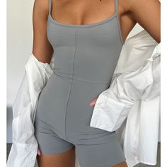 Gray Romper Never Used Still Have Tags On Size Small Gray Jumpsuits And Rompers For Spring, Gray Solid Color Jumpsuit For Spring, Spring Gray Solid Color Jumpsuit, Casual Gray Summer Bodysuit, Gray Casual Summer Bodysuit, Gray Bodysuit For Spring Loungewear, Spring Gray Bodysuit For Loungewear, Gray Spring Bodysuit For Loungewear, Spring Gray Loungewear Bodysuit