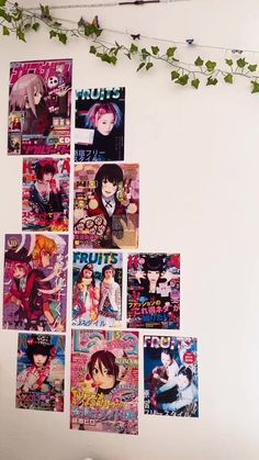 a bunch of anime posters hanging on the wall next to a bed with ivy growing over it