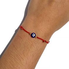 "🧿 SUMMER SALE 2021 🧿 You are looking at the trendy Red String Navy Blue Glass Evil Eye Adjustable Bracelet. Video Tutorial: https://youtu.be/LFSR8Q2q2x4 The History of the Evil Eye: The evil eye is one of the strongest and most powerful ancient symbols in the world. It dates back as early as 5000 BC in Mesopotamia and has roots in Christian, Jewish, Muslim, Buddhist, and Hindu cultures. The evil eye's roots run deep, worn daily in antiquity and today, and for good reason. The Power and Symbol Adjustable Red Evil Eye Friendship Bracelets, Red Evil Eye Friendship Bracelet, Adjustable Red Charm Bracelet, Adjustable Red Round Charm Bracelet, Adjustable Round Red Charm Bracelet, Adjustable Red Bracelets With Evil Eye, Red Adjustable Evil Eye Bracelet, Adjustable Red Evil Eye Bracelet For Friendship, Red Evil Eye Bracelet Gift