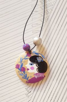 Round Wooden Pendant, hand-painted "Jane Eyre".This design is inspired by Jane Eyre.Handpainted with acrylic paint peace of wood is protected with hypoallergenic varnish.  -Wood size : 4 cm (1,57 inches) wide / 4 cm (1,57 inches) high / 3 mm thick. -Length 40cm (15,7 inches).Please note that the item in the picture is a sample. Every piece is an original one and therefore there may be differences in the direction and effect of the wood grain and in the hand painting.The pendant is water resistan Artistic Wooden Beads Necklace As Gift, Artistic Wooden Bead Necklaces For Gifts, Artistic Necklaces With Wooden Beads For Gifts, Wooden Jewellery, Wooden Necklace, Jane Eyre, Felt Christmas Ornaments, Wooden Pendant, Wood Sizes