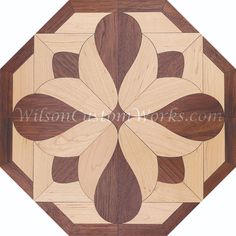 a wooden table top with an intricate design on the center and sides, made from wood