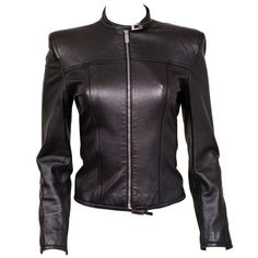 Step Into A Piece Of Fashion History With The Gucci By Tom Ford 1997 Black “G” Buckle Leather Biker Jacket, Size 40. Debuted On The 1997 Runway, This Striking Jacket Features Signature “G” Accent Buckles In Silver On The Collar, Sleeve Openings, And Hem. Crafted From Luxurious Black Leather, The Design Includes Shoulder Pads, Zip Pockets, A Zip Closure, And A Sleek, Collarless Neckline. Perfect For U.S. Sizes Xs/S, The Jacket Offers A Tailored Fit With Measurements Of Bust 34.5”, Waist 30”, Shou Leather Jacket Gucci, Gucci Luxury Long Sleeve Leather Jacket, Luxury Vintage Single-breasted Leather Jacket, Luxury Black Leather Button-up Jacket, Fitted Embroidered Long-sleeved Leather Jacket, Gucci Jacket, Leather Biker Jacket, Black Leather Jacket, Biker Jacket