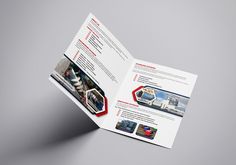 an open brochure with images of trains on the front and back pages in red, white and blue