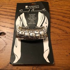 This Is A Brand New Scarf Accent. It Is A Cylindrical Slide Through Which You Pull Your Scarf And Create Your Own Sense Of Fashion. They’re So Much Fun To Wear! It Is A Silver And Black Design With Rhinestones. You’ll Be Able To Use It With A Wide Variety Of Scarves! It Is 1 1/8” Long And 2 1/2” Wide. The Opening Is Approximately 3/4”. Thank You So Much For Visiting My Closet. I Really Appreciate It! Please Let Me Know If You Have Any Questions Or Comments. Cb 21597 Harley Quinn Jacket, Cruella Costume, Scarf Slide, Red Ridding Hood, Rainbow Plush, Braided Leather Belt, Hello Kitty Christmas, Mermaid Inspired, Fantasy Hair