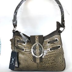 M.C. Marc Chantal Snakeskin Design Olive Bag Nwt Is Beautiful Design. Leather Bag Has Wrapping Still On. Silver Hardware Olive Green Tones And Snake Texture. One Inner Zipper Pocket And Two Slip In Pockets. Zipper Top Closure And Snap Buckle. Zipper Pocket On Back Of Bag.Lots Of Cool Details. Bottom Has Feet. Genuine Leather Olive Approx Measure 15"W X10" H X 5" D Silver Textured Leather Shoulder Bag, Modern Silver Textured Leather Bag, Silver Rectangular Shoulder Bag With Textured Leather, Silver Textured Leather Rectangular Shoulder Bag, Silver Rectangular Textured Leather Shoulder Bag, Rectangular Silver Textured Leather Shoulder Bag, Silver Rectangular Textured Leather Bag, Silver Textured Leather Satchel Bag, Designer Silver Textured Leather Shoulder Bag