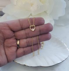 Gold Dainty Necklace, Tiny Heart With CZ Stone, 14k Heavy Plated Gold Necklace, Minimalist Necklace, Tiny Heart Necklace, High Quality #DaintyJewelry #14kGoldNecklace #14kGoldPendant #DaintyNecklace #14kGoldJewelry #GoldHeartPendant #HeartPendant #CzJewelry #MinimalistNecklace #DaintyChains Dainty Open Heart Charm Necklace For Her, Dainty Open Heart Charm Necklace As Gift For Her, Dainty Heart Necklace With Clavicle Chain For Anniversary, Dainty Gold-plated Open Heart Necklace, Dainty Gold Plated Open Heart Necklace, Open Heart Charm Necklace With Delicate Chain For Her, Delicate Chain Open Heart Charm Necklace Gift For Her, Dainty Gold-plated Heart Necklace With Clavicle Chain, Dainty Heart Cut Charm Necklace With Adjustable Chain