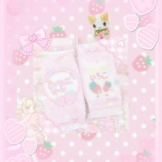 two pink items are laying next to each other on a polka dot background with hearts