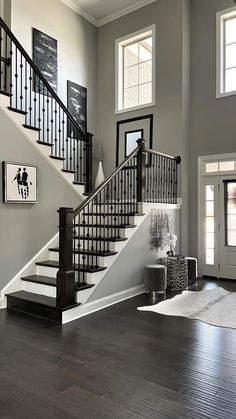 the stairs in this house are black and white