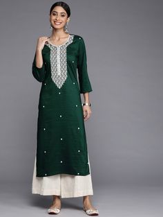 HAND CRAFTED KURTA DESCRIPTION * Colour: green and white * Ethnic motifs yoke design * Round neck * Three-quarter, regular sleeves * Straight shape with regular style * Thread work detail * Calf length with straight hem * Regular raw silk *Package Contains:- Only One Kurta *Wash Care:- Hand Wash AVAILABLE IN 6 SIZES THEY ARE IN FOLLOWING MEASUREMENTS IN INCHES:- XS:- Bust-34/Waist-30/Shoulder-14/Length-46 S:- Bust-36/Waist-32/Shoulder-14.5/Length-46 M:- Bust-38/ Waist-34/Shoulder-15/Length-46 L: Indian Party Wear Dresses, Yoke Design, Kurtis For Women, Party Wear Dress, Ethnic Motifs, Indian Party, Indian Party Wear, Silk Kurta, Party Kleidung