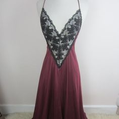 Fabulous Vintage Adonna Sweeping Flowy Glamorous Romantic Hollywood Starlet Nightgown Women's Size Small - bust 34", waist 28", length 54"-55", sweep width 136" or 68" across bottom hem Boysenberry Red with Black Lace Bodice/Waist Crisscross Spaghetti Straps with Back Tie Close Liquid Silky Nylon Fabric Machine Wash Excellent Condition Fitted Lace Bodice Nightgown For Evening, Fitted Backless Nightgown For Wedding Night, Night Fitted Dress With Contrast Lace, Night Dresses Fitted With Contrast Lace, Fitted Dress With Contrast Lace For Night, Fitted Lace Trim Backless Sleepwear, Fitted Contrast Lace Dress For Night, Fitted Lace Trim Sleepwear For Evening, Fitted Lace Trim Nightgown For Evening