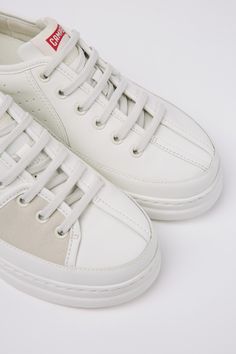 White multicolored recycled leather and nubuck women's sneakers with OrthoLite® Recycled™ removable footbeds and XL EXTRALIGHT® Sustainable + outsoles (51% recycled).In 1988, we challenged the idea that shoes should be identical, designing a mismatched pair with asymmetric details — and our iconic TWINS was born.