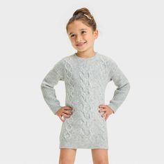 Dress up your toddler in comfort and cute style with this Long-Sleeve Dress from Cat & Jack™. The long-sleeve dress is crafted from knit cotton-blend fabric for comfortable wear. Designed with a round neckline and half-length button-down for ease of wear, this knee-length dress features side pockets for stashing small stuff on the go. Cat & Jack™: Designed for all children so you can trust it's made for yours.